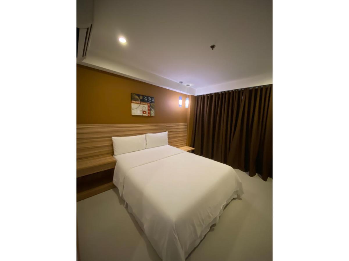 Capital O 820 Guijo Suites Makati Manila Exterior photo