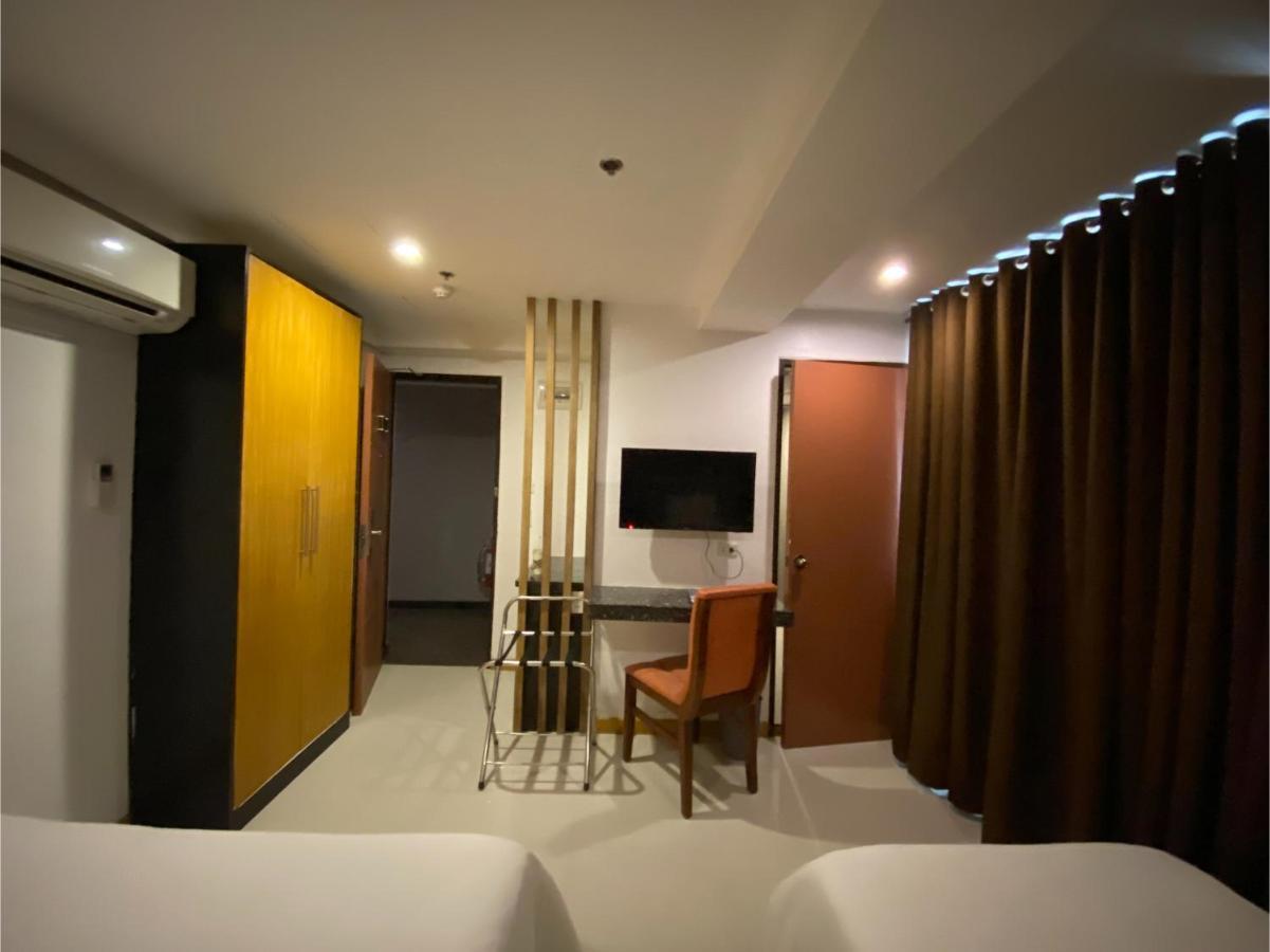 Capital O 820 Guijo Suites Makati Manila Exterior photo